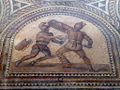 1024px-Detail of Gladiator mosaic, a Thraex (left) fighting a Murmillo (right), Römerhalle, Bad Kreuznach, Germany (8196070427).jpg